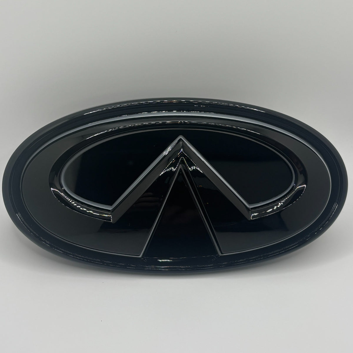 Infiniti Q50 White LED Grille Emblem Gloss Black 2018-2024
